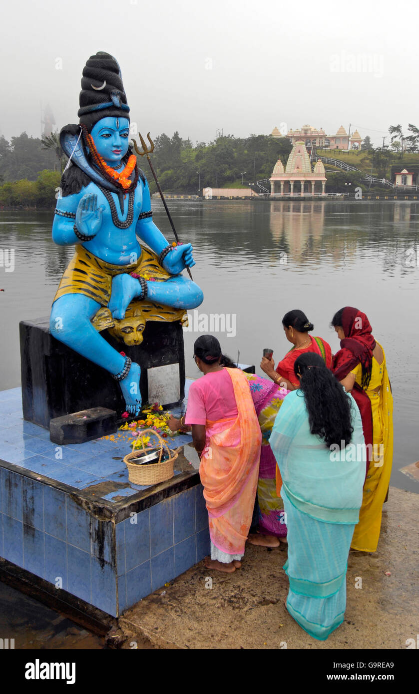 Shiva statue, Hindu prayers, at holy lake Grand Bassin, sacrifice, Mauritius / Hindu festival Maha Shivaratree Stock Photo