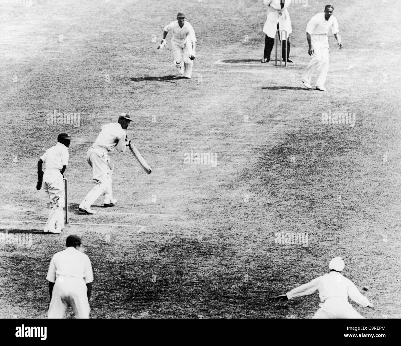England's Douglas Jardine (second l) edges a ball from India's L Amar Singh (top r) past the slips Stock Photo