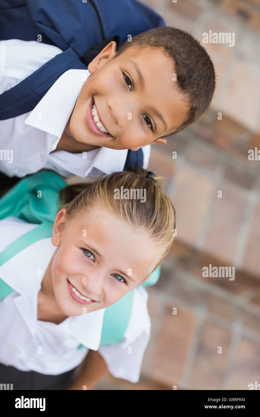 Portrait of boy and girl in school uniform Stock Photo