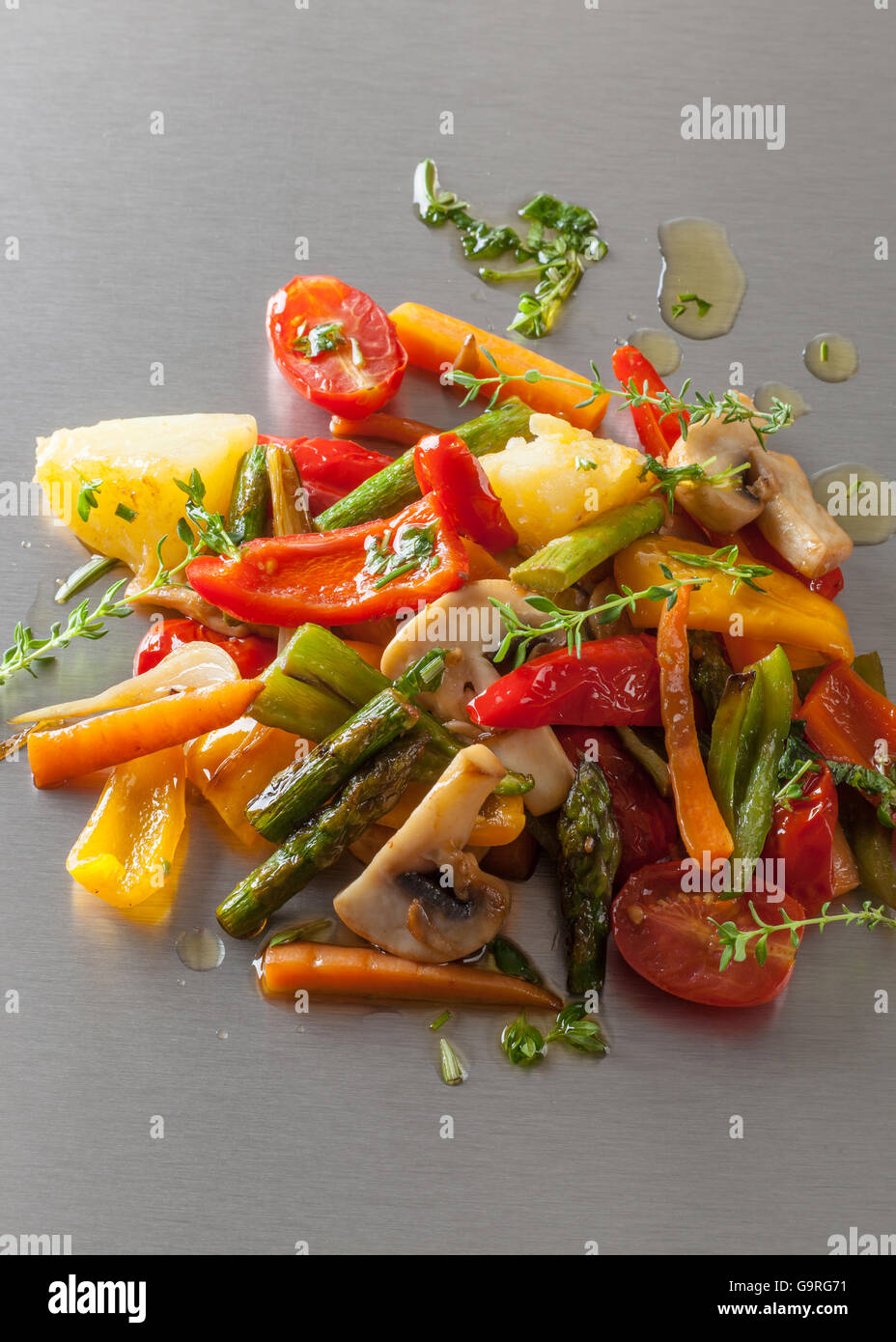 Grilled Vegetables With Spicy Oil On A Japanese Teppanyaki Grill Plate Grilled Vegetables With Spicy Oil On A Japanese Teppanyaki Grill Plate