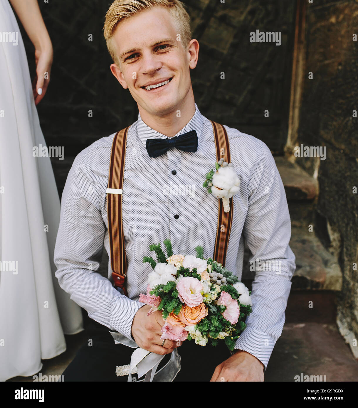bride sitting on stone steps Stock Photo - Alamy