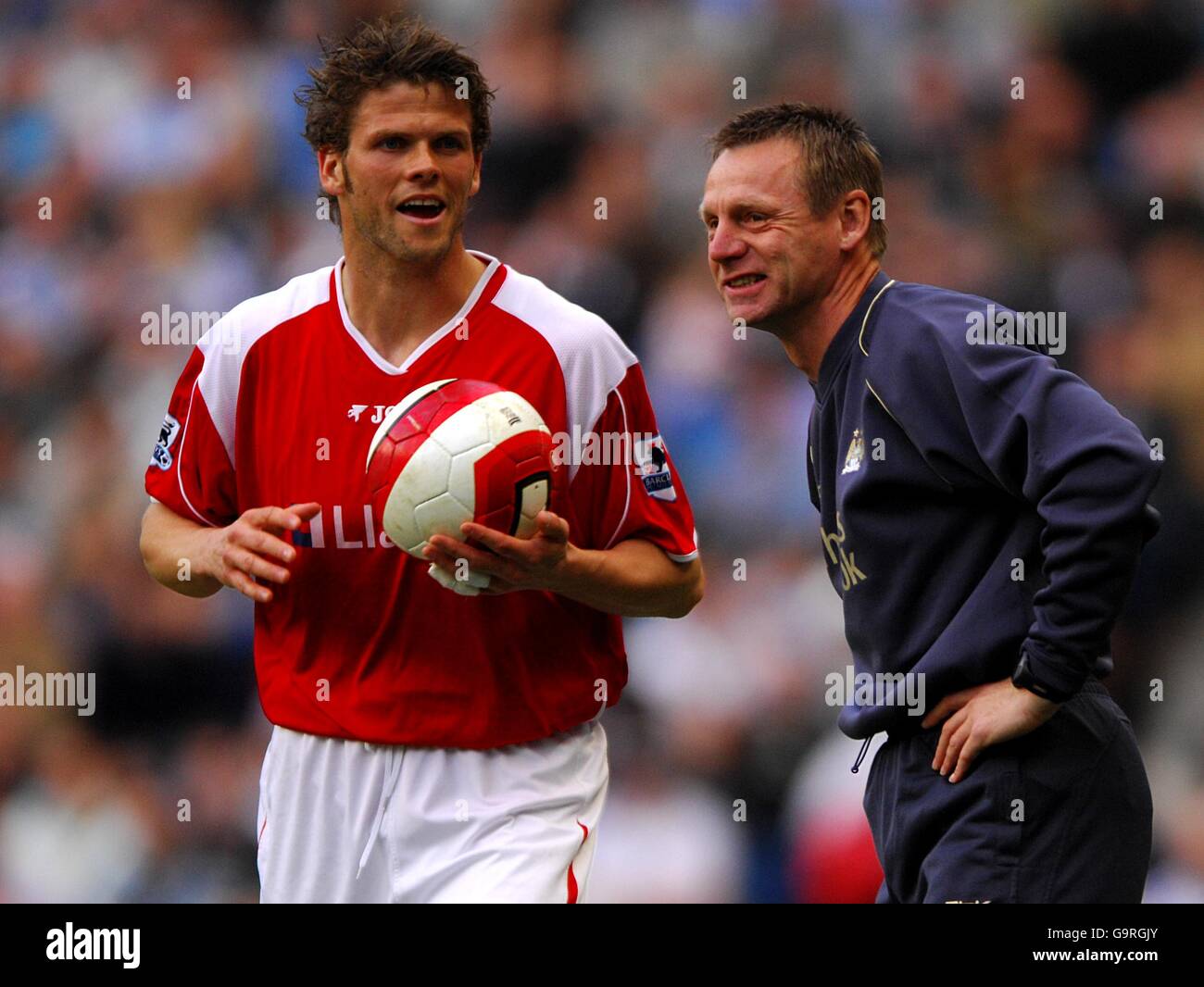 Soccer - FA Barclays Premiership - Manchester City v Charlton Athletic - The City of Manchester Stadium. Manchester City manager Stuart Pearce shares a joke with Charlton Athletic's Hermann Hreidarsson Stock Photo