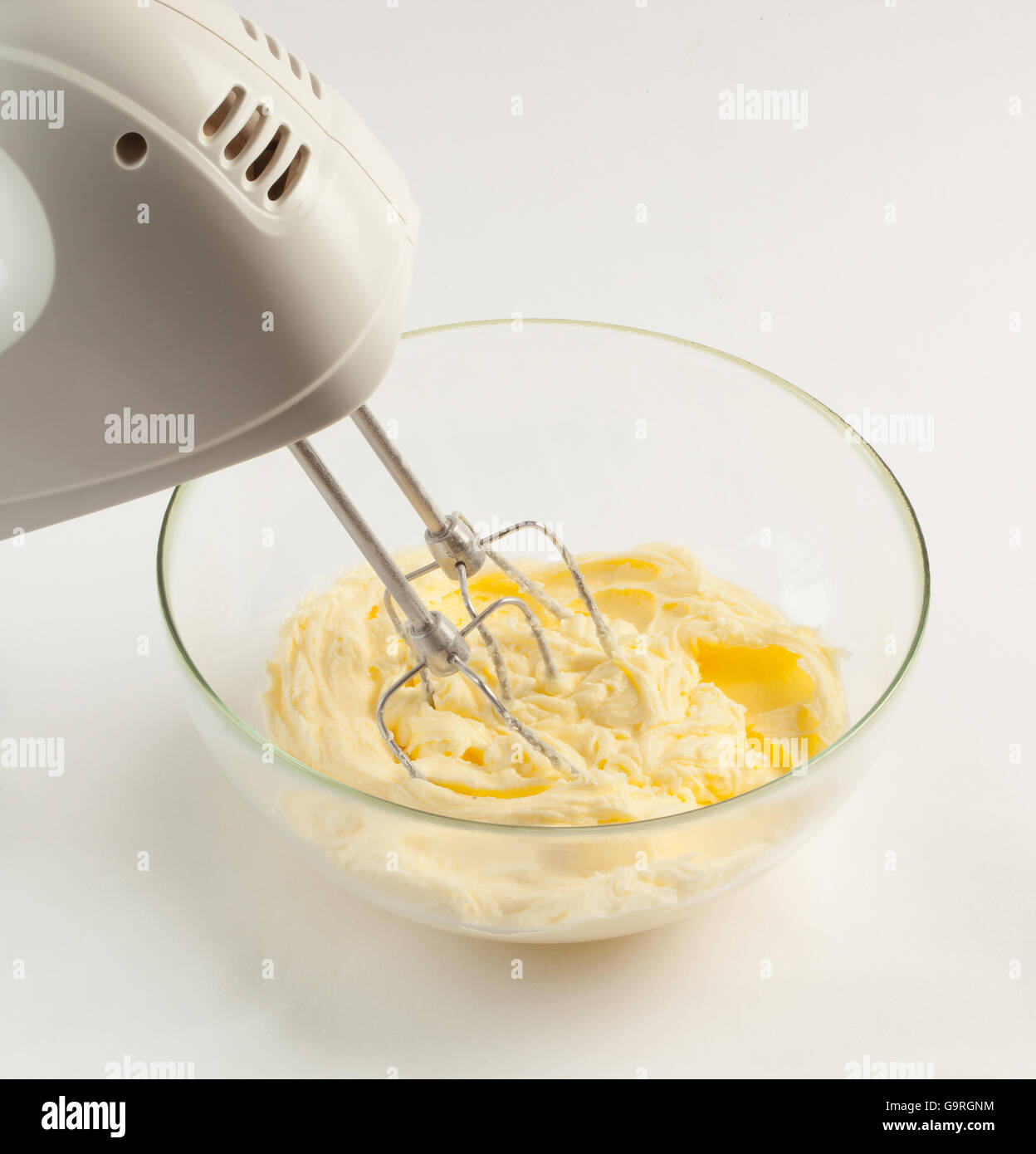 Making buttercream with an electric mixer Stock Photo