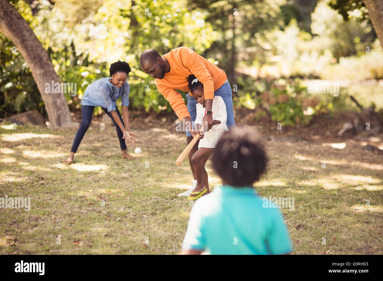 Happy family having fun Stock Photo - Alamy