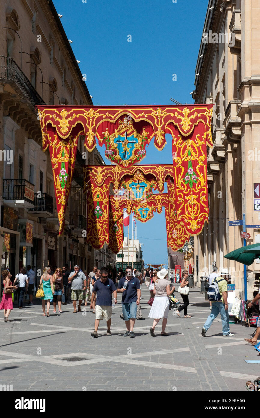 Ornamental tapestry, decorated, Republic Street, former Queen Street, La Valletta, Malta / il-Belt Valetta Stock Photo