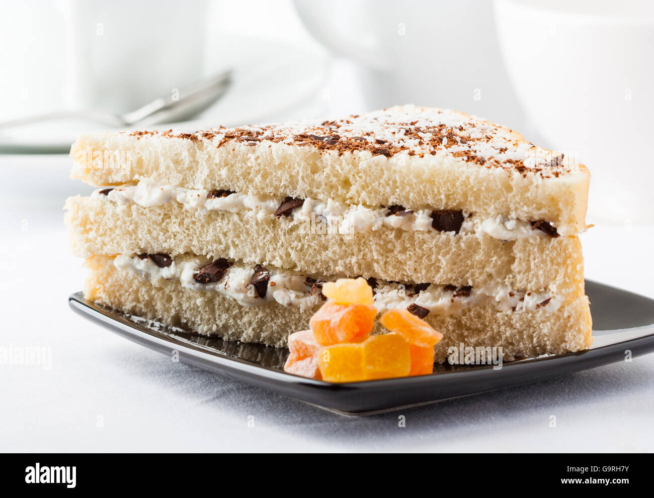 A sweet layered sandwich with ricotta cheese and chocolate chunks Stock Photo