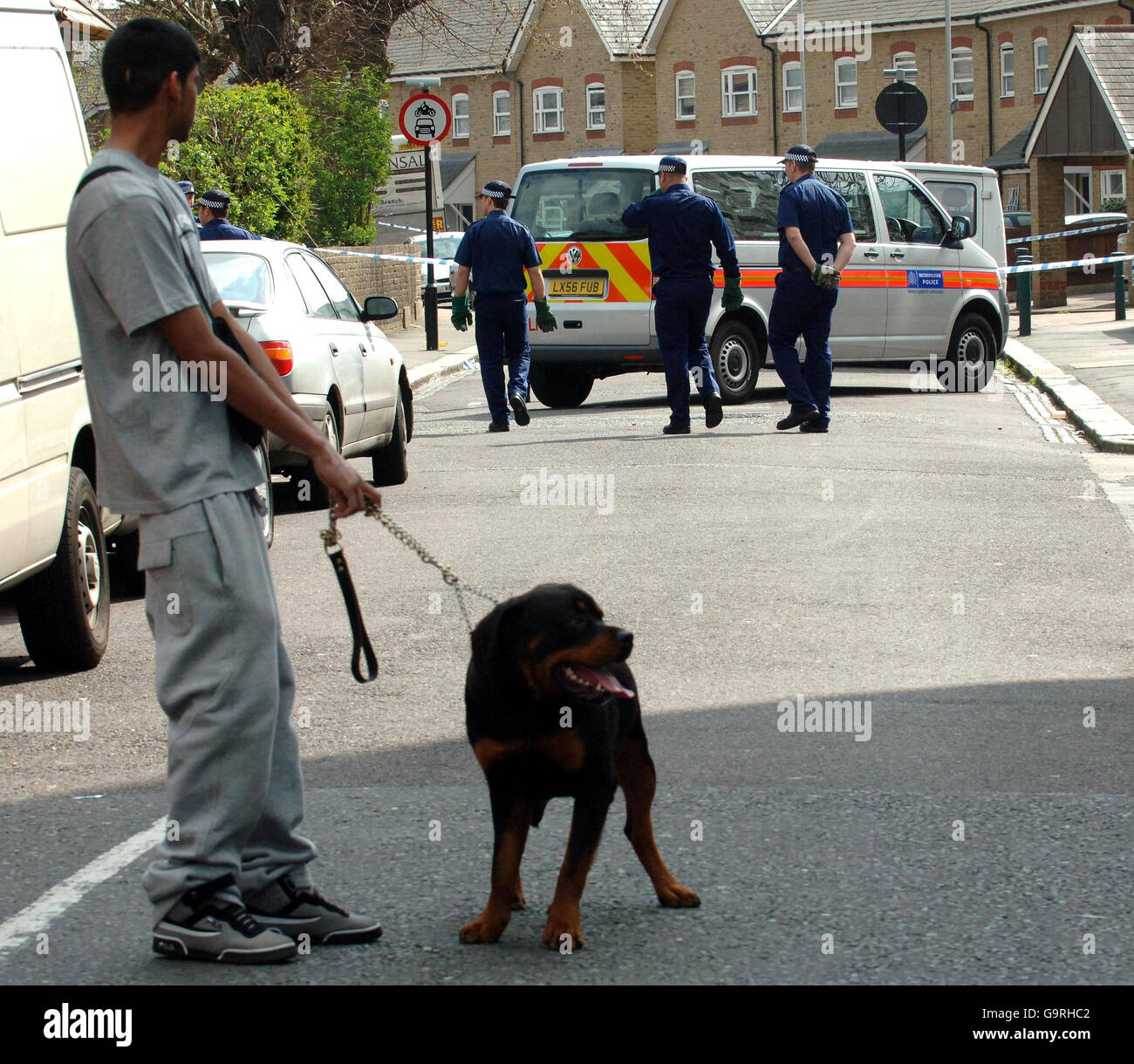 Scene of crime officers are seen close to an entrance to Gean Court in