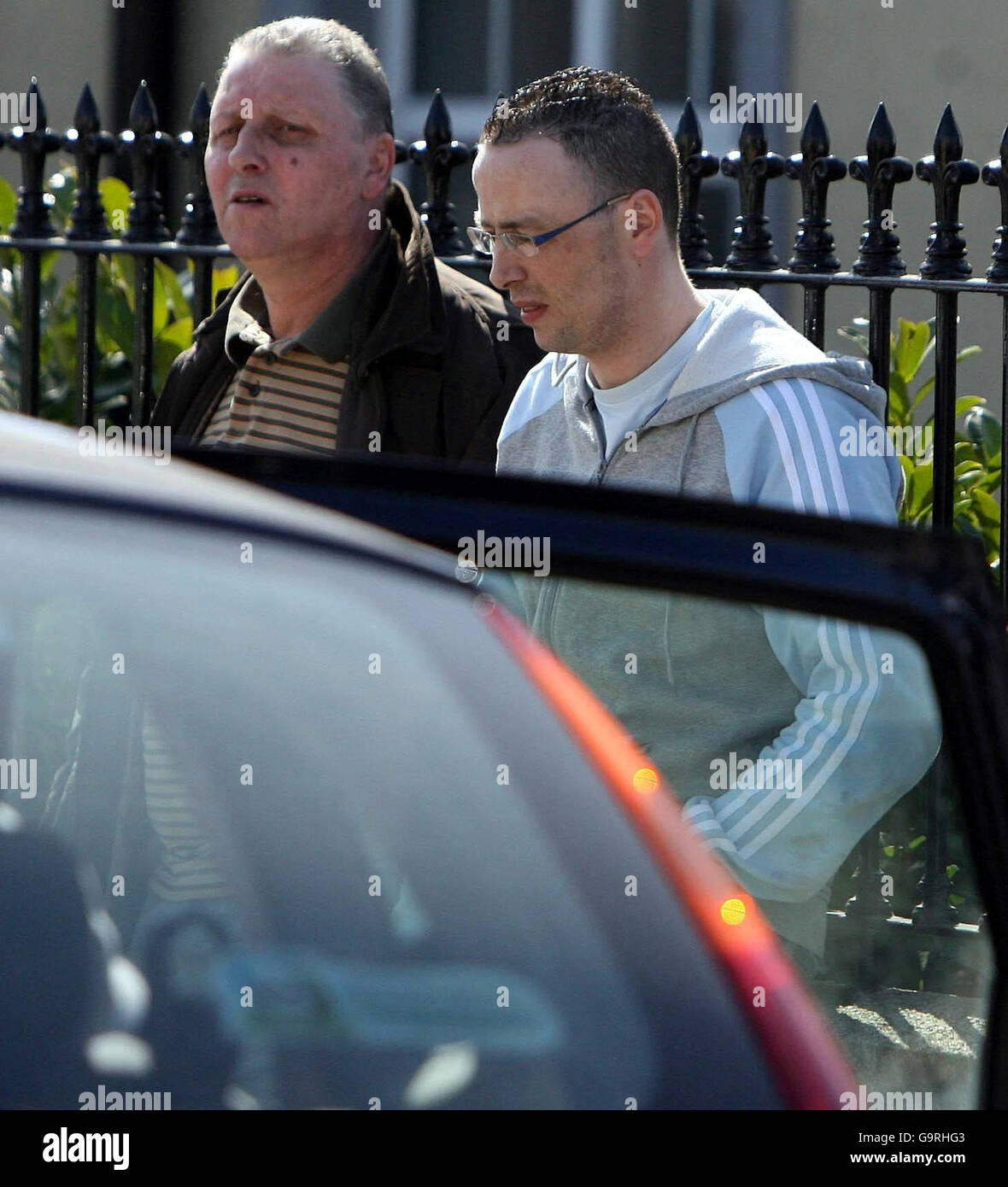 Larry (left) and Robert Wheelock, the father and brother respectively of Terrence Wheelock, who died in police custody, stand at the scene of a fatal shooting of a 26-year-old man at a block of apartments at around 11.45pm last night in Clontarf in the north of Dublin. Stock Photo