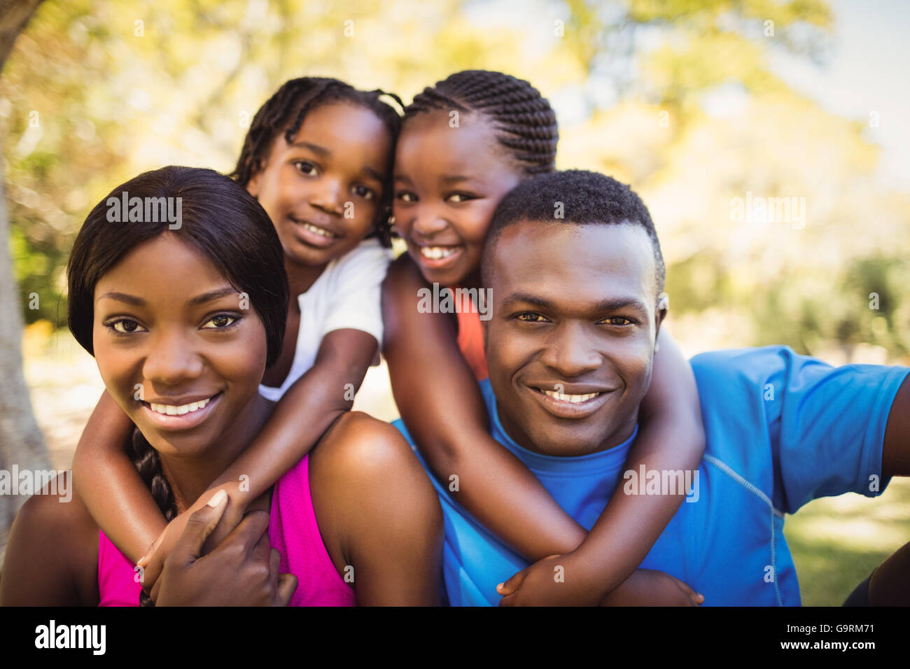 Happy family posing together Stock Photo - Alamy