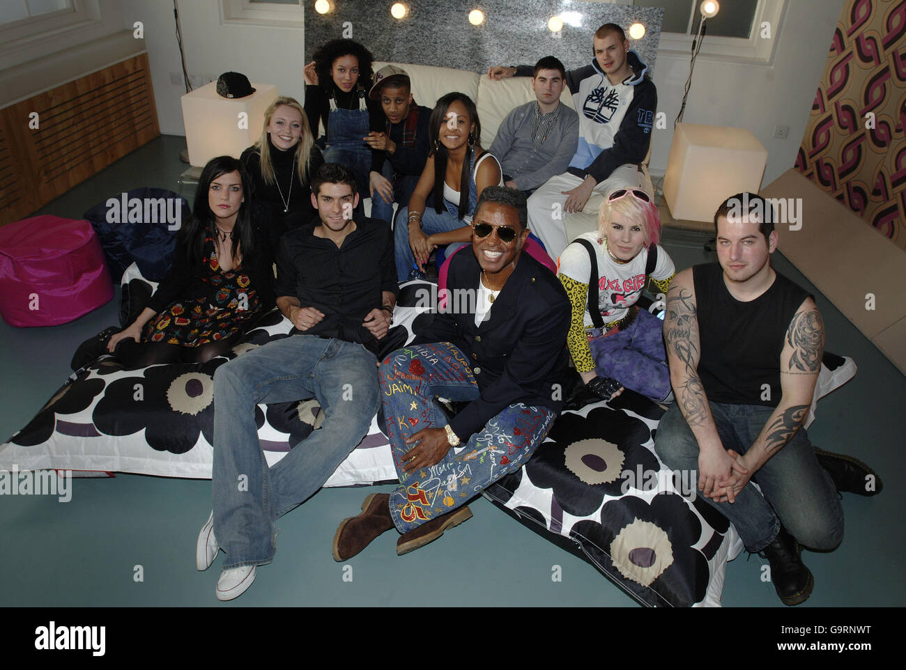American musician Jermaine Jackson (front centre) with performers from T4 reality show Musicool which aims to find the most talented young musicians around and make them better; (from left to right, back row to front) Abi Ryan, Cleo Humphrey, Michael Whittaker, Annikka Gabbitas, Darren Smith, Chris Royle, (front row) Fe Salmon, Nick Barrett, Esther Barton and Will Atkinson, at recording studios in Kentish Town, north London. Stock Photo