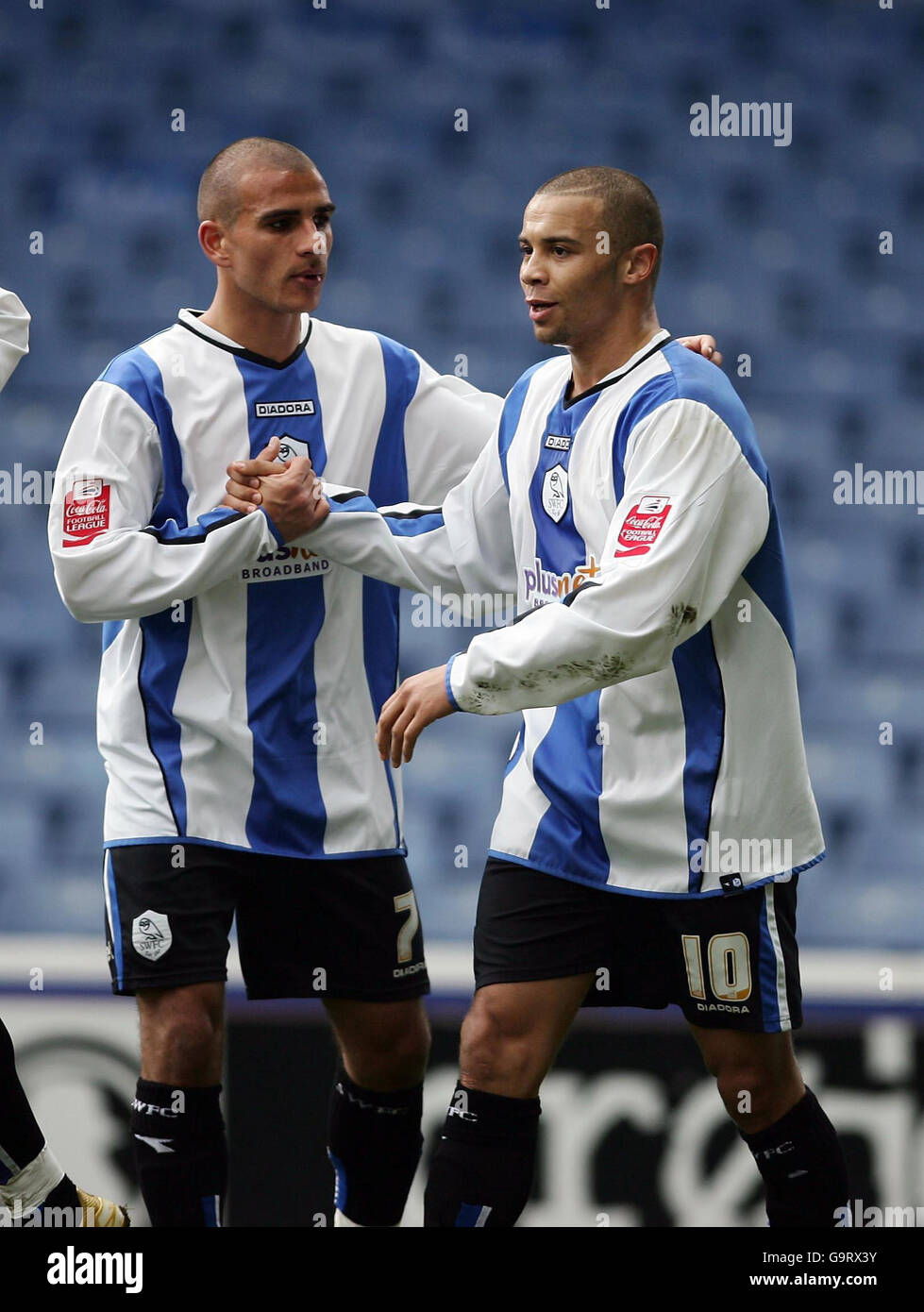 Sheffield Wednesday's Deon Burton celebrates with Marcus Tudgay (left) after scoring during the Coca-Cola Football League Championship match at Hillsborough, Sheffield. Stock Photo