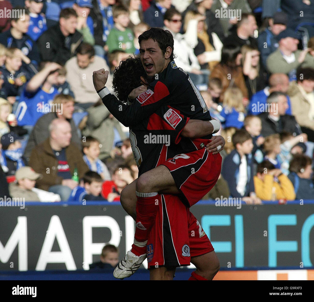 QPR's Inigo Idiakez (left) celebrates after scoring their first goal with Lee Cook during the Coca-Cola Football League Championship match at the Walkers Stadium, Leicester. Stock Photo
