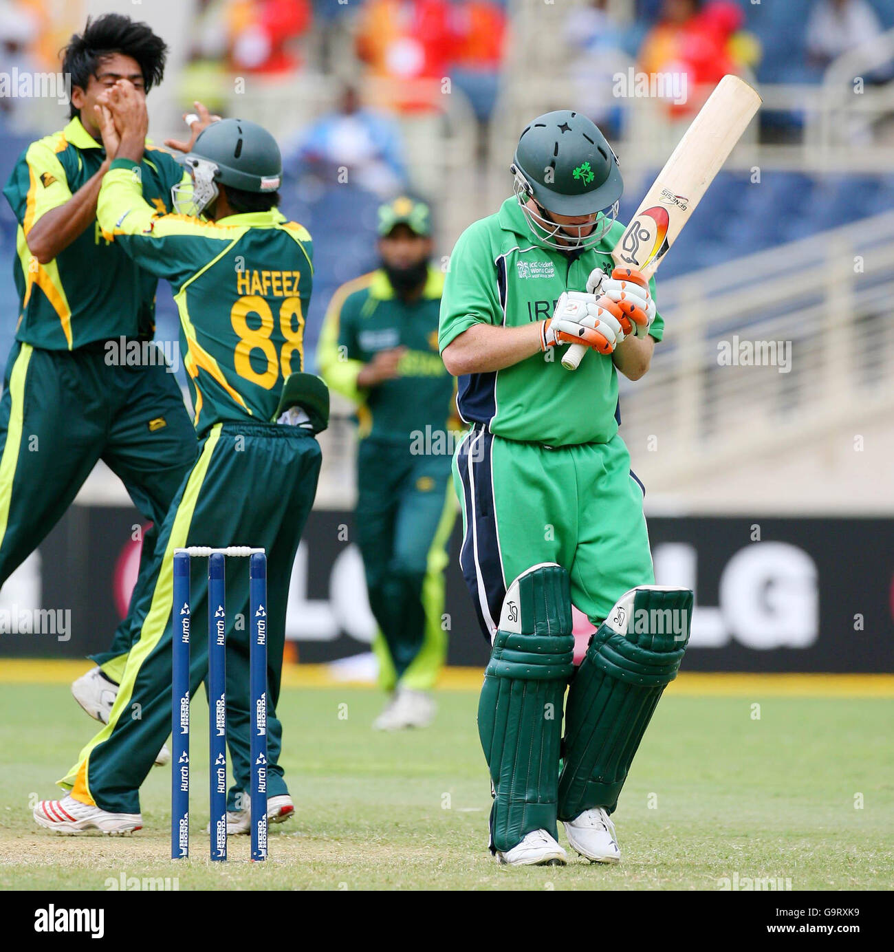 Ireland S Eoin Morgan Right Leaves The Field After Losing His Wicket To Pakistan S Mohammed Sami Left During The Icc Cricket World Cup 2007 Group C Match At Sabina Park Kingston Jamaica Stock