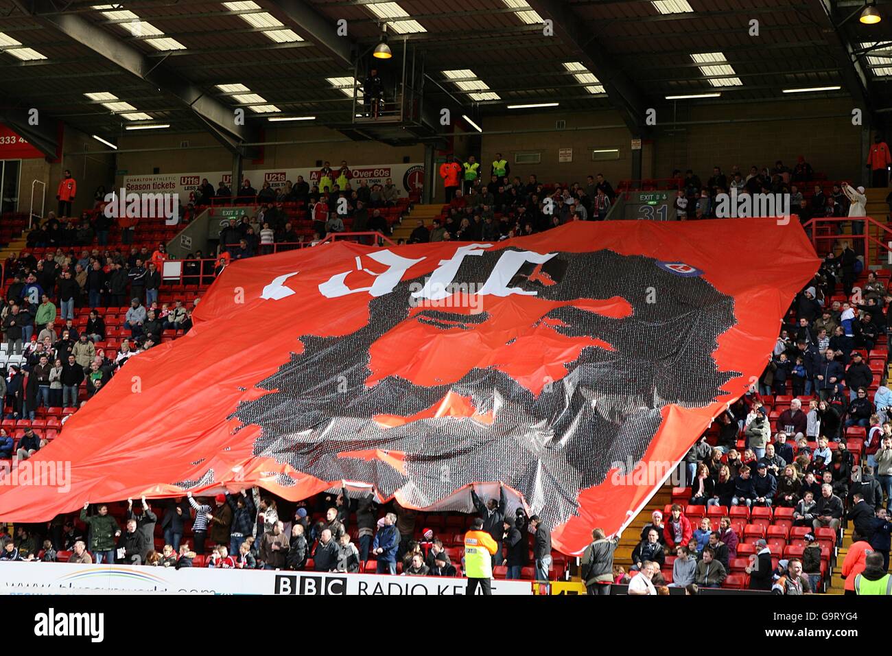 Charlton Athletic fans pass a flag around the stadium before kick off ...