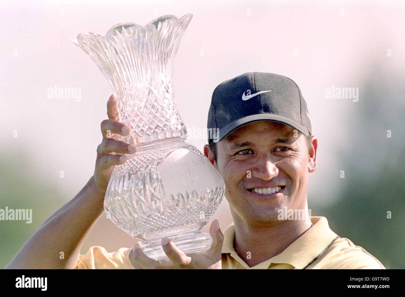 Golf, Heineken Classic. Michael Campbell holds aloft the winners trophy