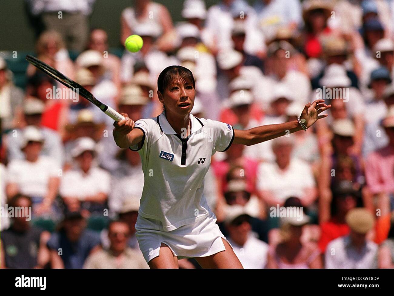 Tennis - Wimbledon Championships - First Round. Shinobu Asagoe in action against Venus Williams at Wimbledon. Stock Photo