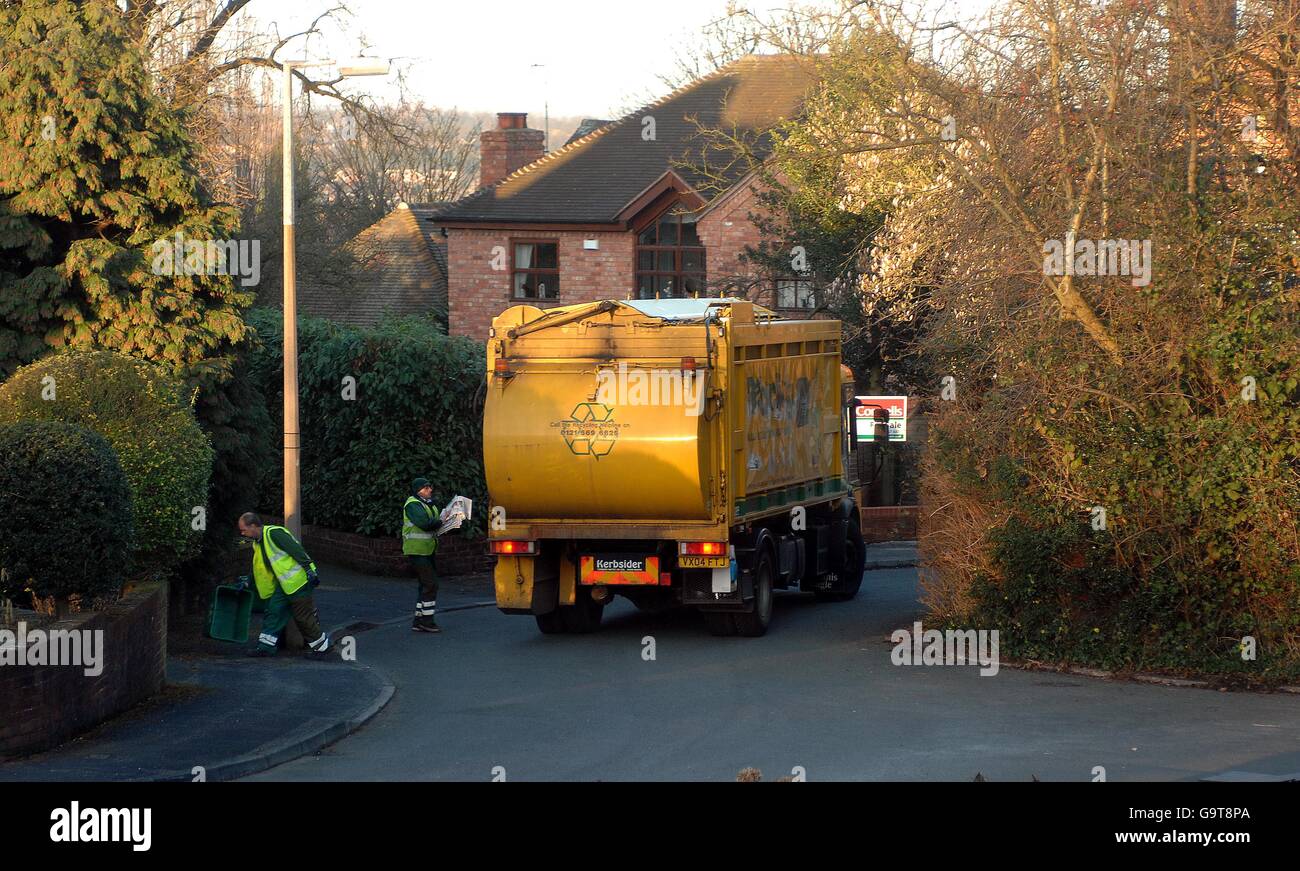 A refuse vehicle in Sandwell, West Midlands, collects domestic rubbish for recycling. Stock Photo