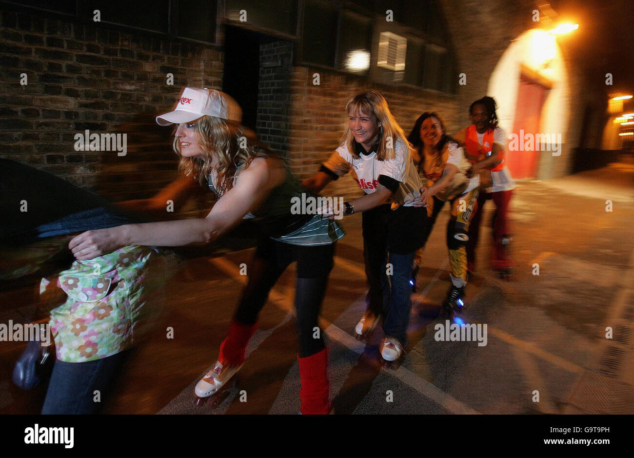 A member of the public warms up before attempting the Blistex Roller