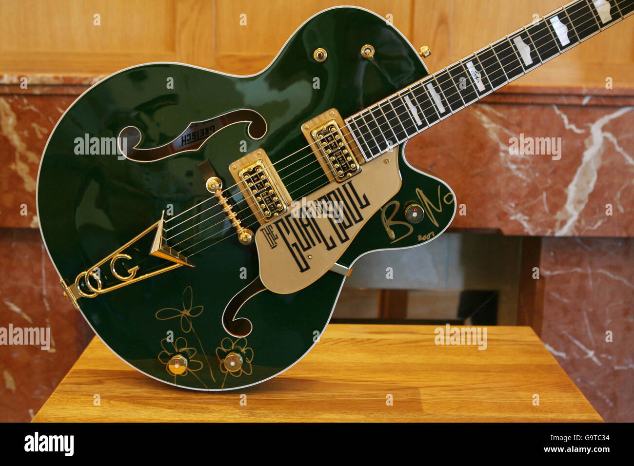 A Bono signed Irish Falcon Gretsch Guitar on display at the Clarence Hotel in Dublin before they are auctioned in New Yok next week in aid of the Music Rising Charity. Stock Photo