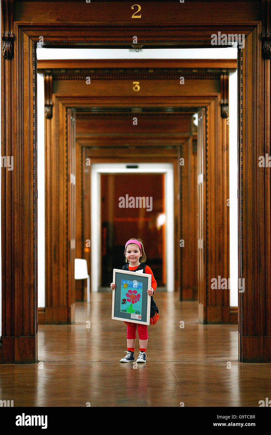Four-year old Sophie Jane Gibbons, at the Hugh Lane Gallery, Dublin, holds her painting 'Flower and Ladybird', second prize winner in the under six category of this year's 53rd Texaco Children's Art Competition. Stock Photo