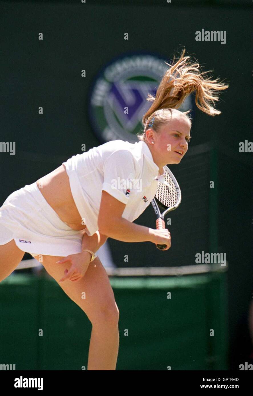 Tennis, Wimbledon 2001, Third Round. Jelena Dokic in action against Barbara Schett Stock Photo