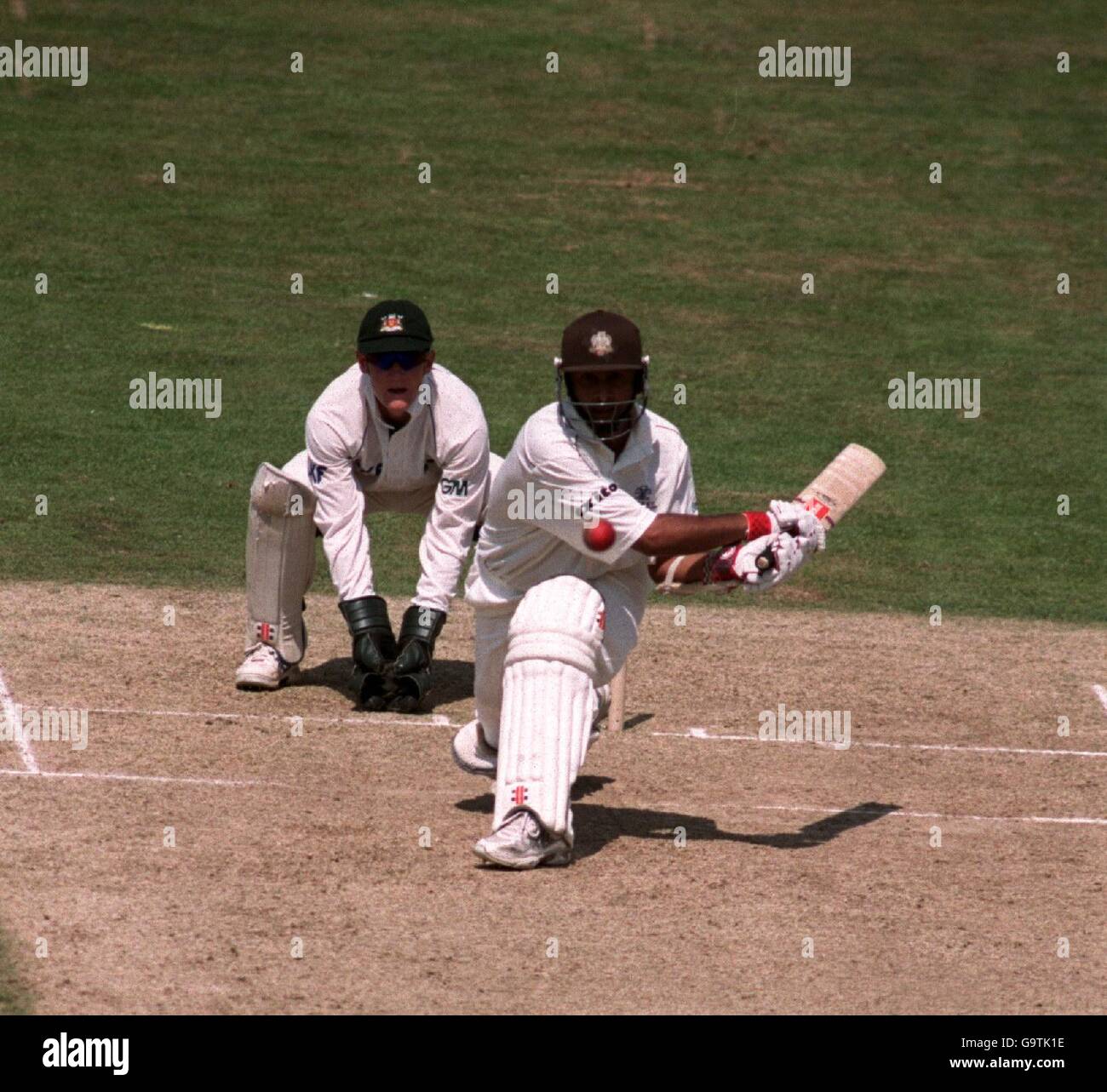 Surrey's Nadeem Shahid batting against Nottinghamshire's Richard Stemp Stock Photo