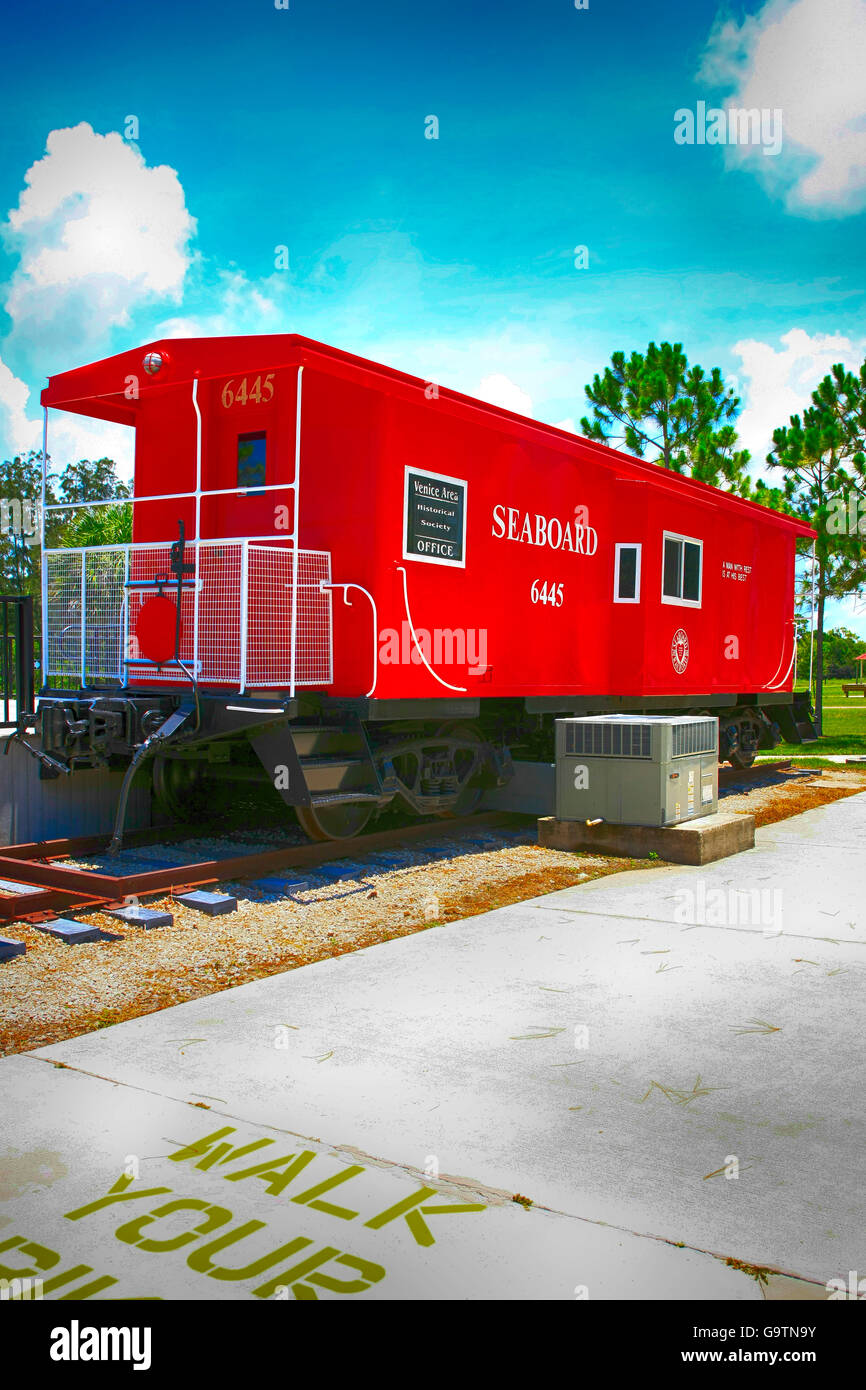 Red Seaboard Railway freight car at the Legacy Trail Train Depot in Venice FL Stock Photo