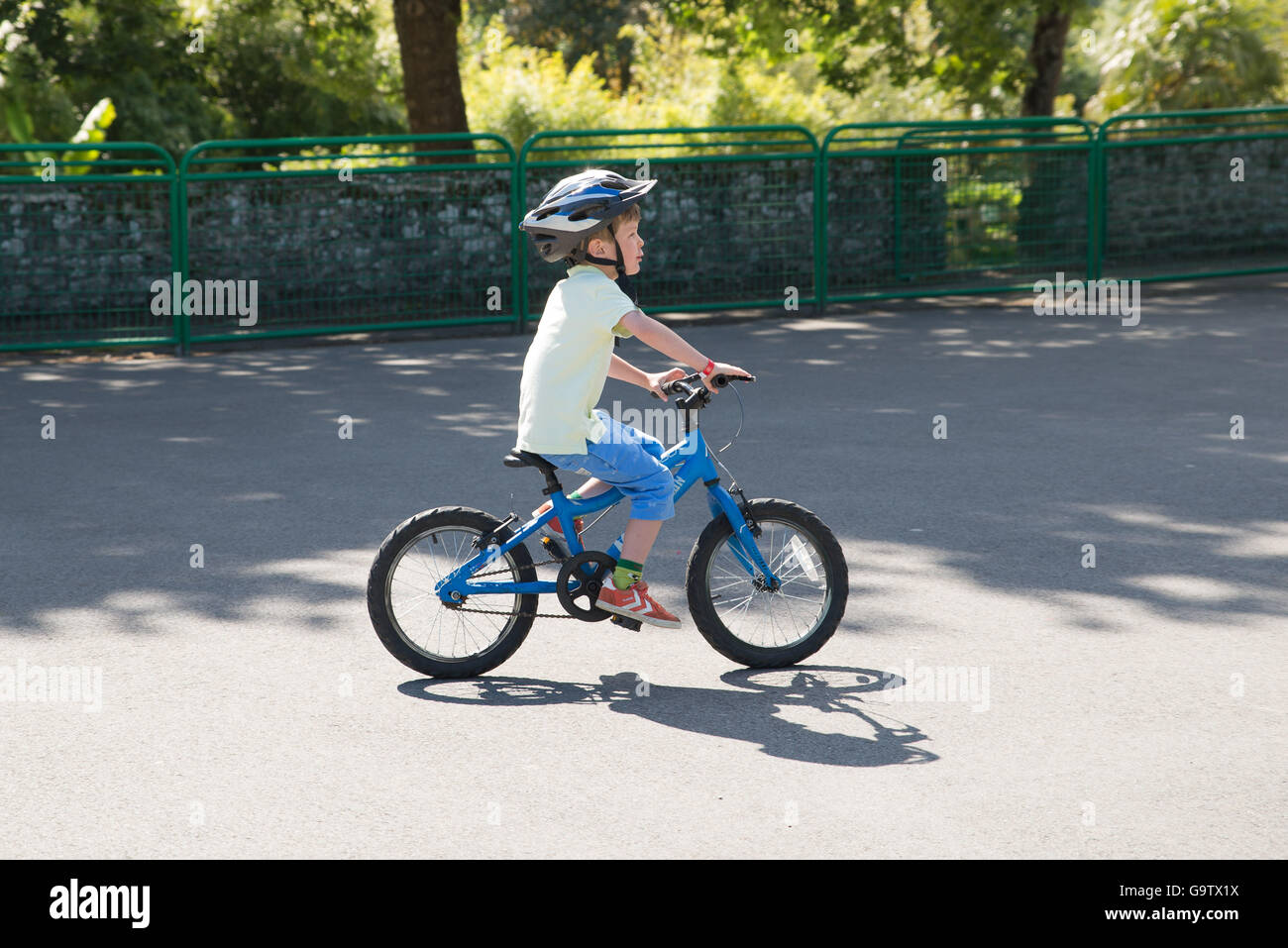 Child on bike at a learn to ride session at Eurocamp Dol De Bretagne in Brittany Stock Photo