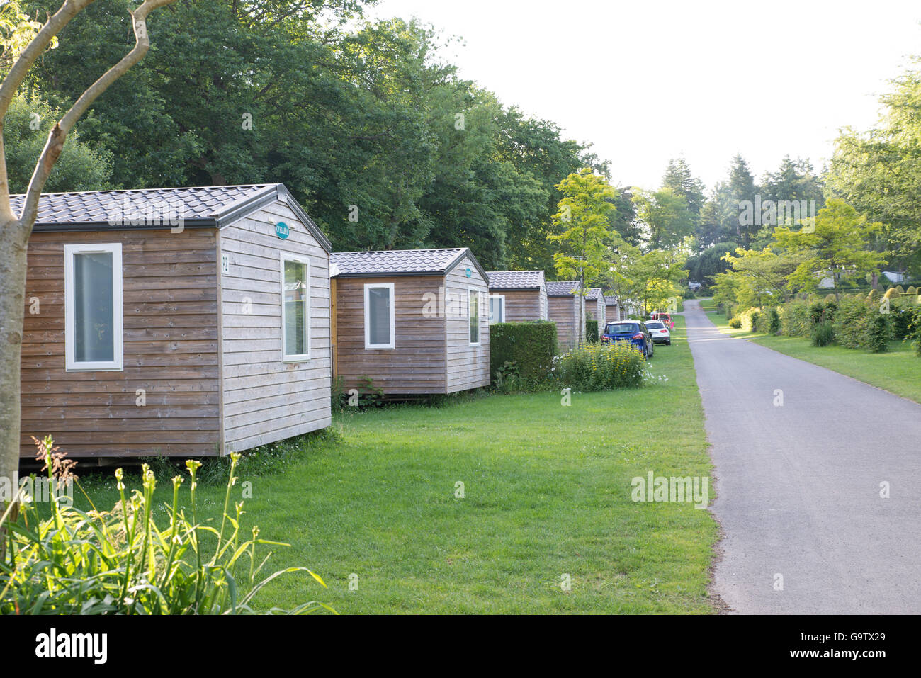 Mobile holiday homes at Domaine Des Ormes campsite in Dol De Bretagne, Brittany France Stock Photo