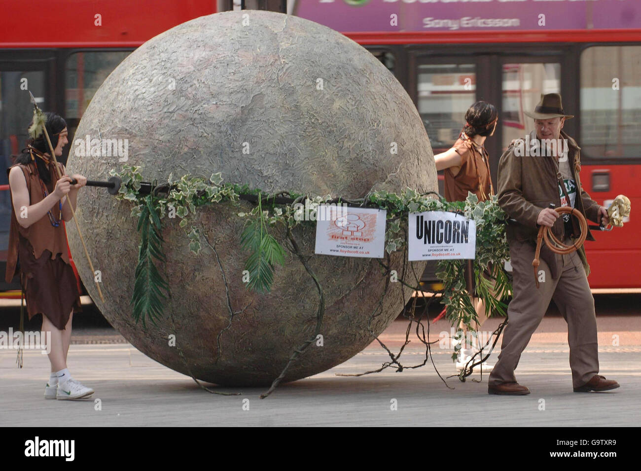 Fundraising marathon runner Lloyd Scott prepares for his latest attempt to raise money in the London Marathon this year by pulling a 300lb, 8ft diameter boulder around the 26 mile course whilst dressed as his cinema hero Indiana Jones. Stock Photo