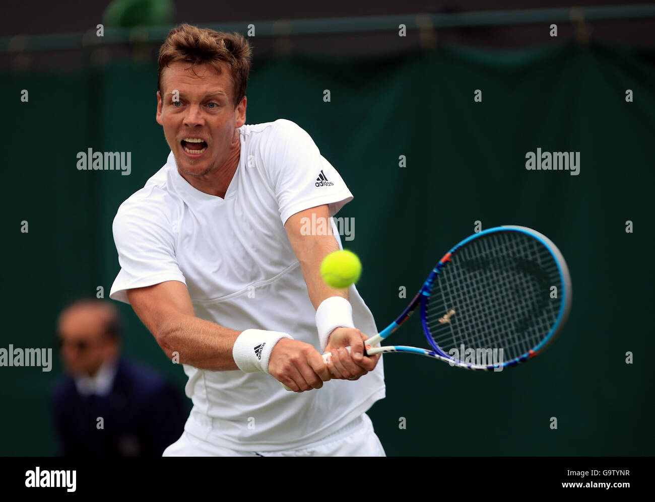 Tomas Berdych in action against Benjamin Becker on day Five of the  Wimbledon Championships at the All England Lawn Tennis and Croquet Club,  Wimbledon Stock Photo - Alamy