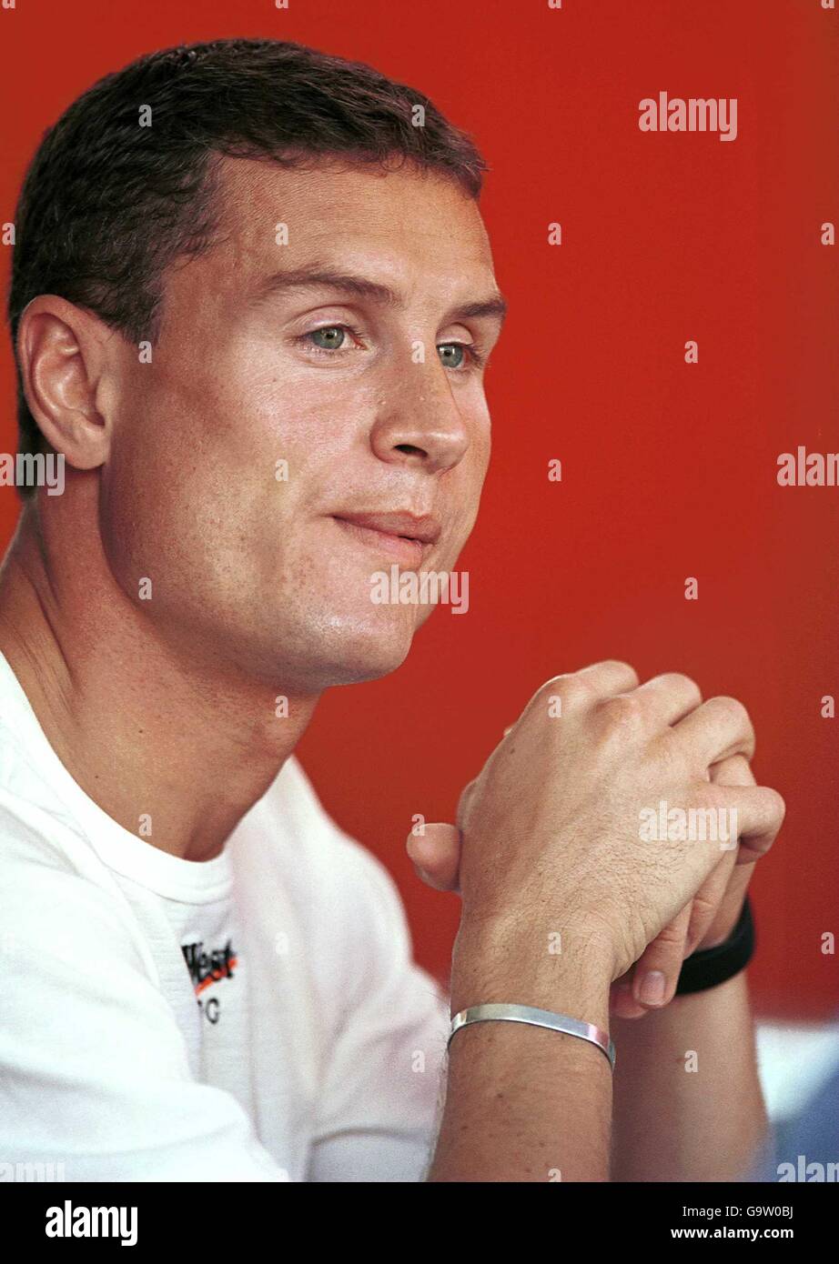 David Coulthard deep in thought in the paddock after a disasterous German Grand Prix Stock Photo