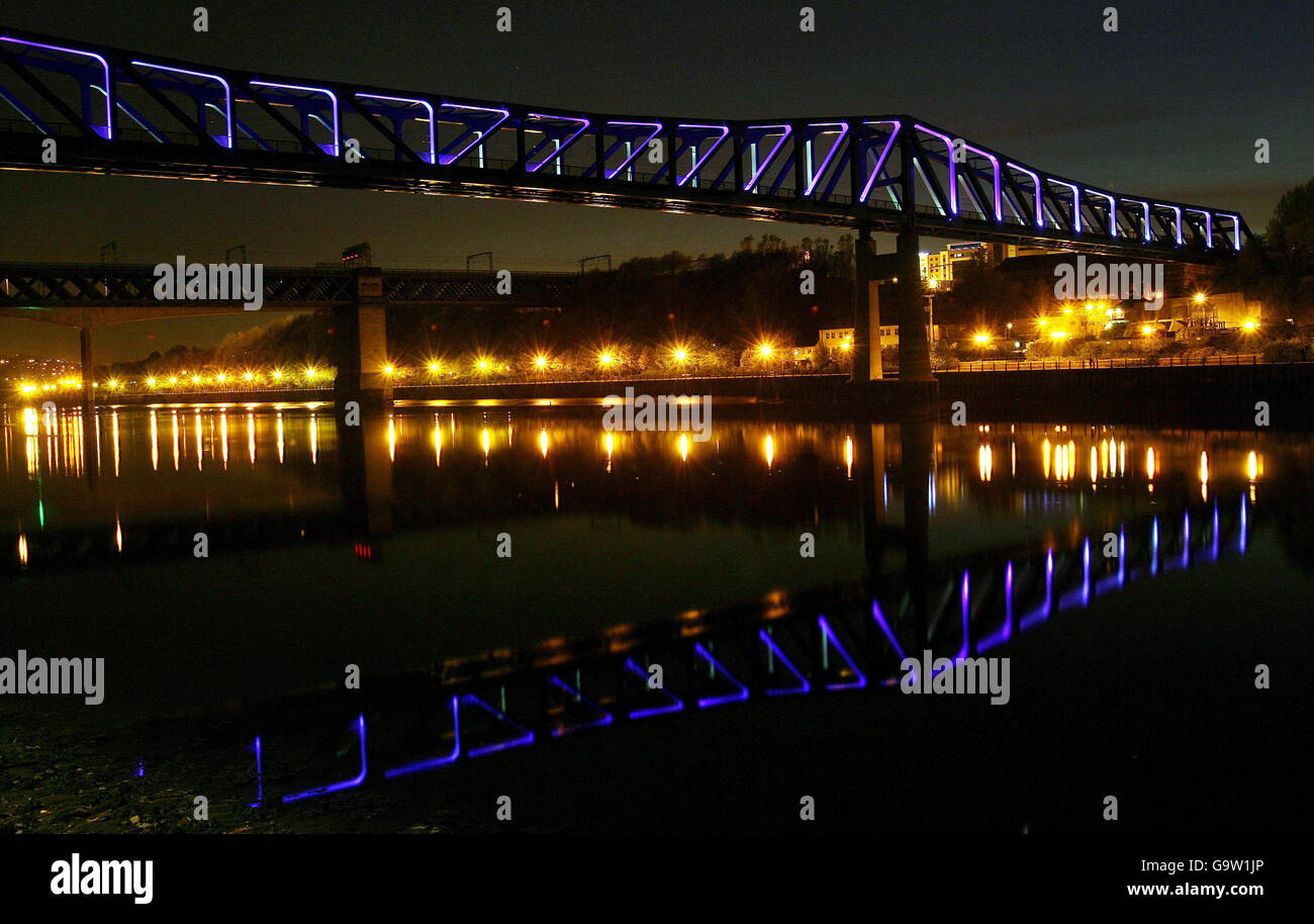 A new art light show is unveiled on the Metro Bridge over the River Tyne in Newcastle. Stock Photo