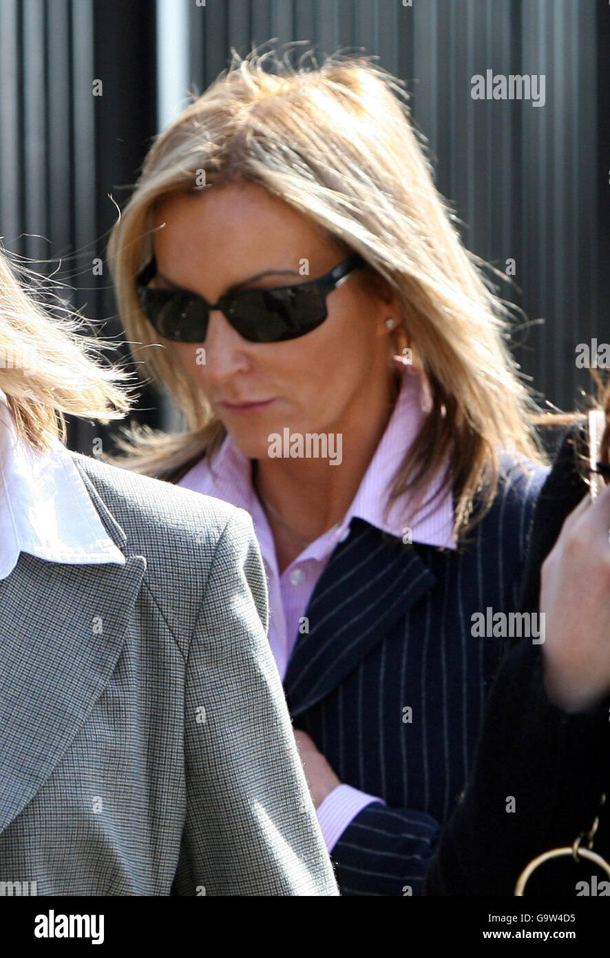 Kathleen McAleese (centre), 49, arrives at Ballymena court. Stock Photo