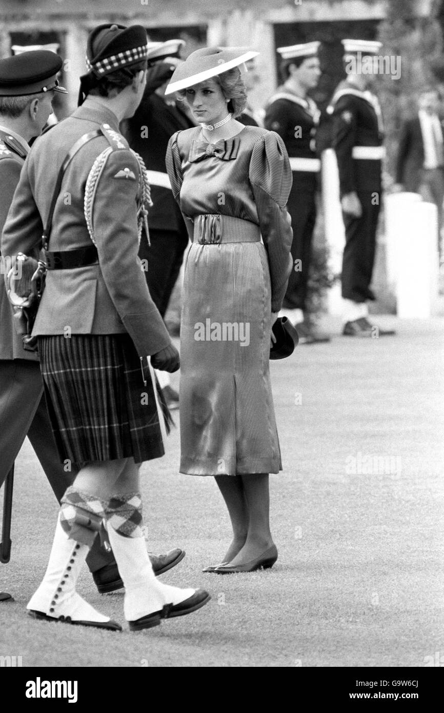 The Prince and Princess of Wales at a ceremony at the Anzio Beach Head cemetery. The Princess wears a wine coloured silk dress and the Prince the uniform of the Gordon Highlanders. Stock Photo