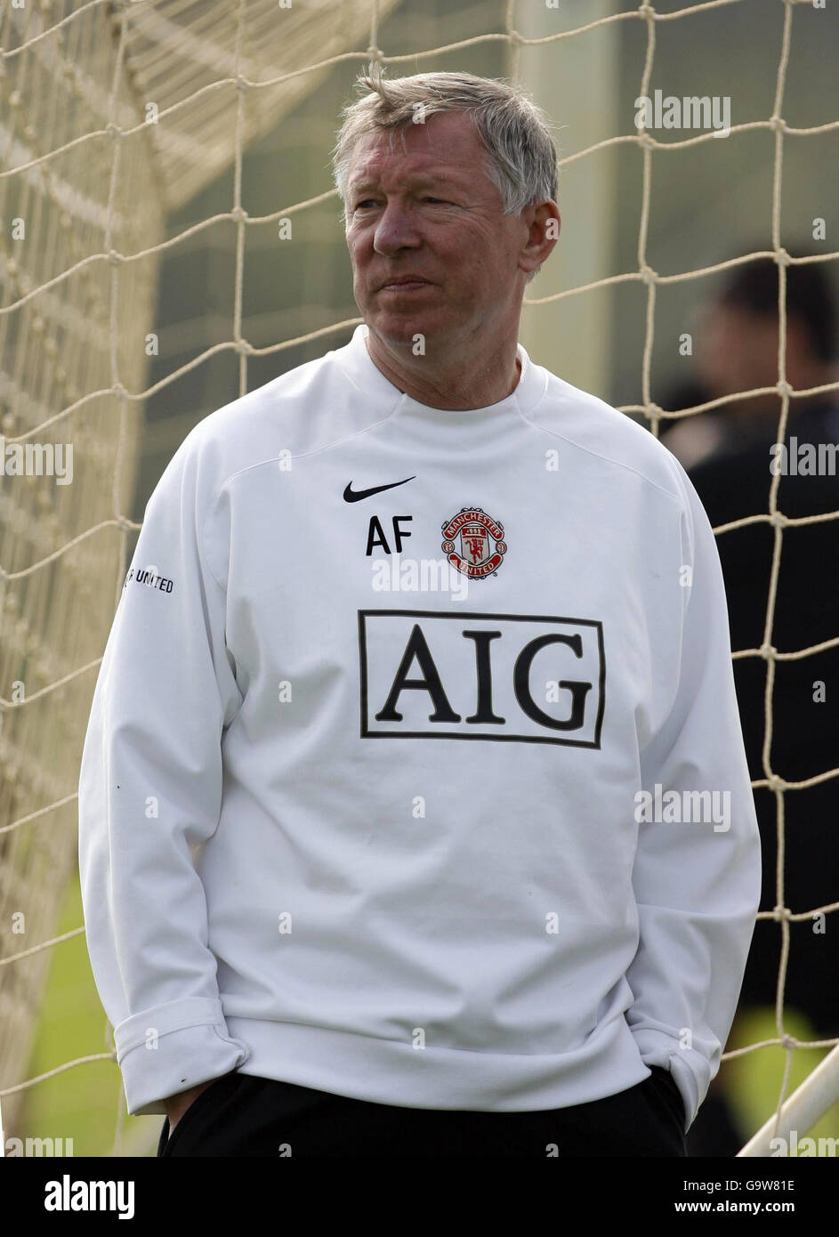 Manchester United's manager Alex Ferguson during a training session at Carrington, Manchester. Stock Photo
