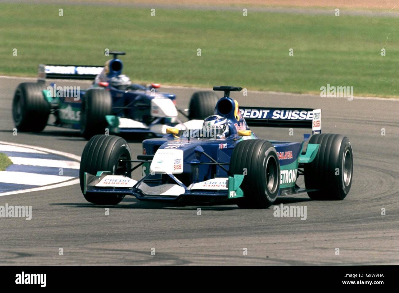 Formula One Motor Racing - British GP - Race Day. Kimi Raikkonen leads Sauber team mate Nick Heidfeld Stock Photo