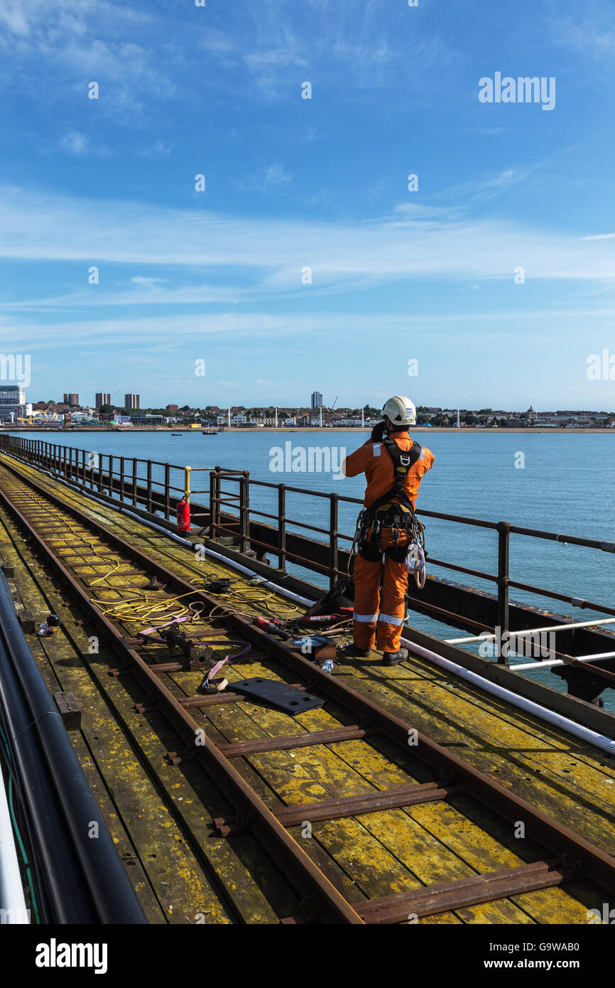 Man Working on Southend Pier Stock Photo - Alamy