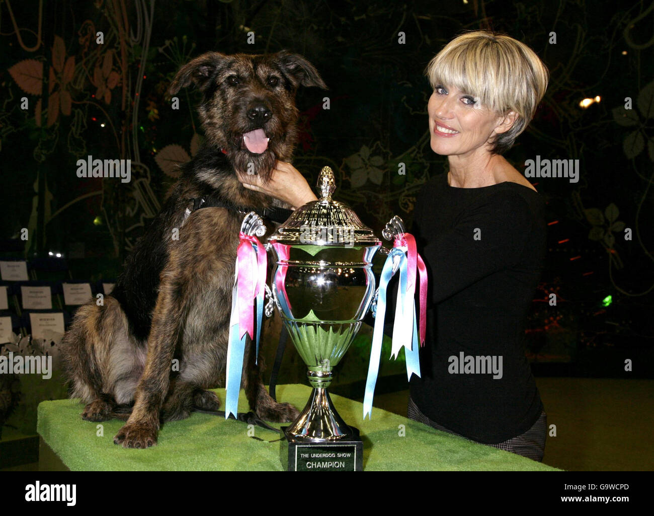 Selina Scott and her dog Chump, with the winners trophy of BBC Two's 'The Underdog Show' at 3 Mills Lane in east London. Stock Photo