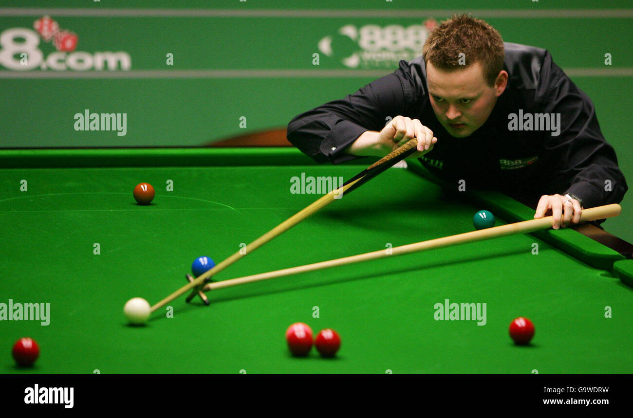 Shaun Murphy in action against John Parrott during the first round match of the World Snooker Championships at the Crucible Theatre, Sheffield. Stock Photo
