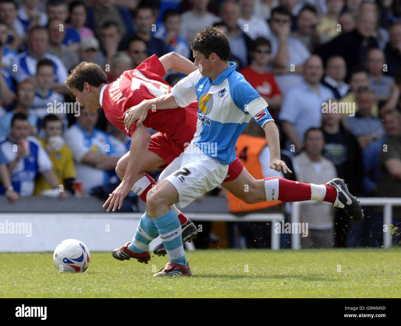 Bristol Rovers Stuart Campbell battles with Swindon towns Lukas Jutkiewicz during the Coca-Cola Football League Two match at the Memorial Stadium, Bristol. Stock Photo