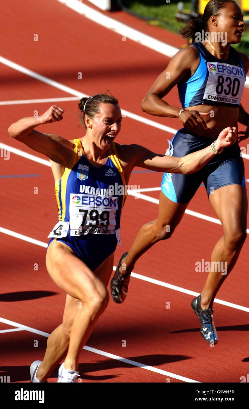 Ukraine's Zhanna Pintusevich-Block celebrates as she crosses the finsh line to win the final of the Womens 100 metres over favourite Marion Jones (right). Stock Photo