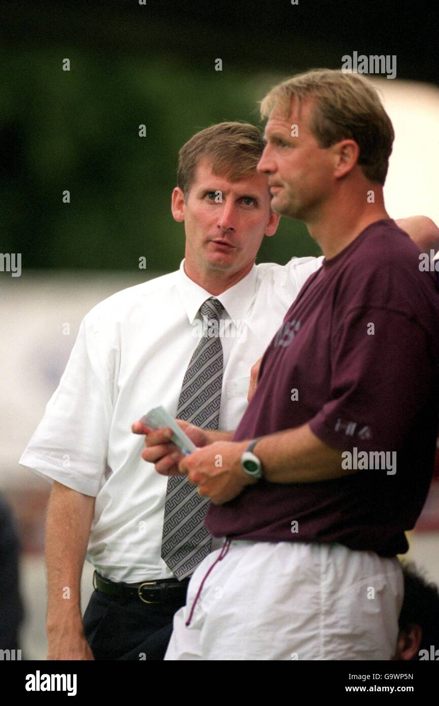 West Ham United Manager Glenn Roeder (l) talks to his assistant Paul Goddard (r) Stock Photo
