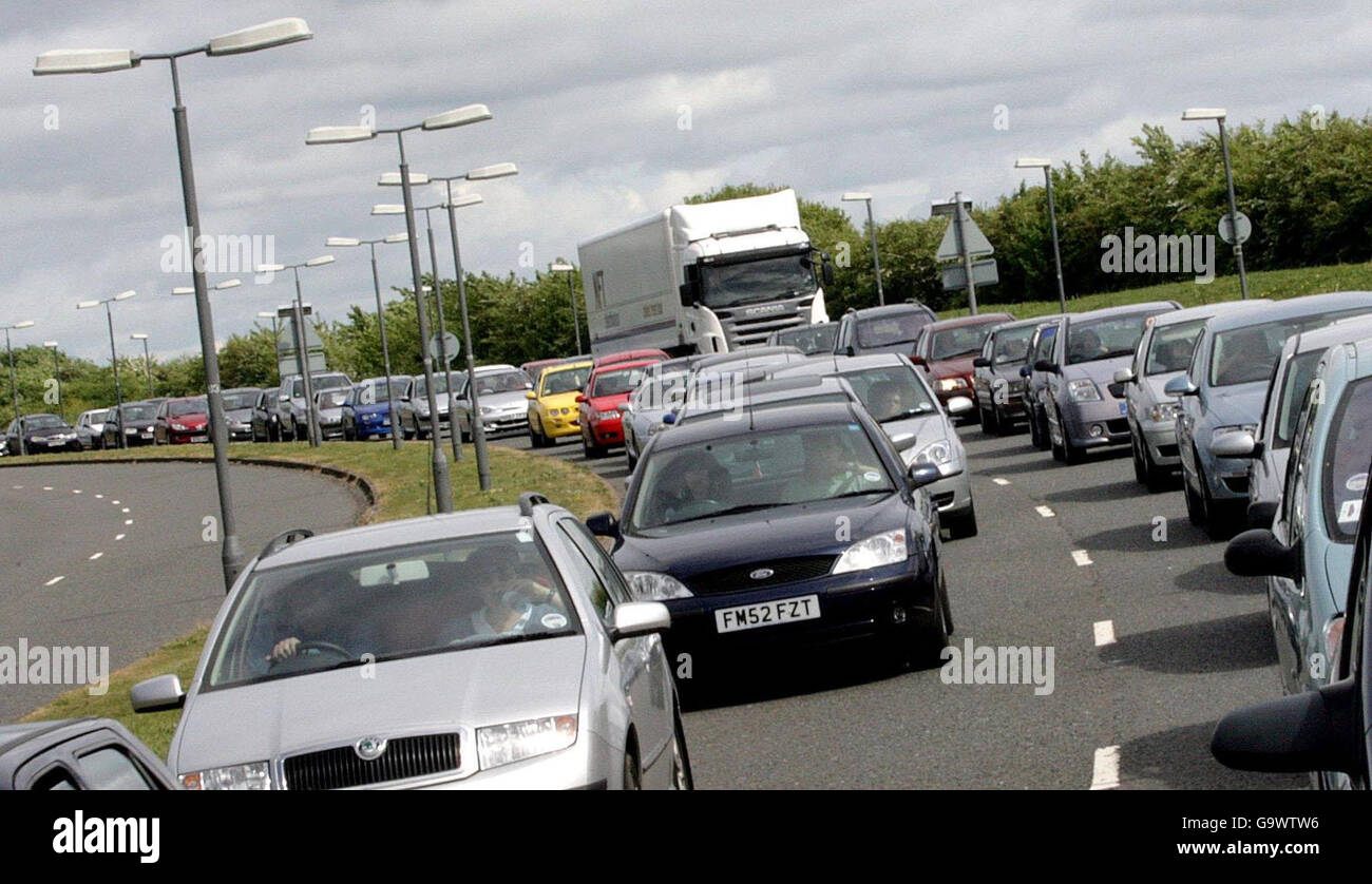 Shoppers queue to exit Cribbs Causeway shopping centre in Bristol on