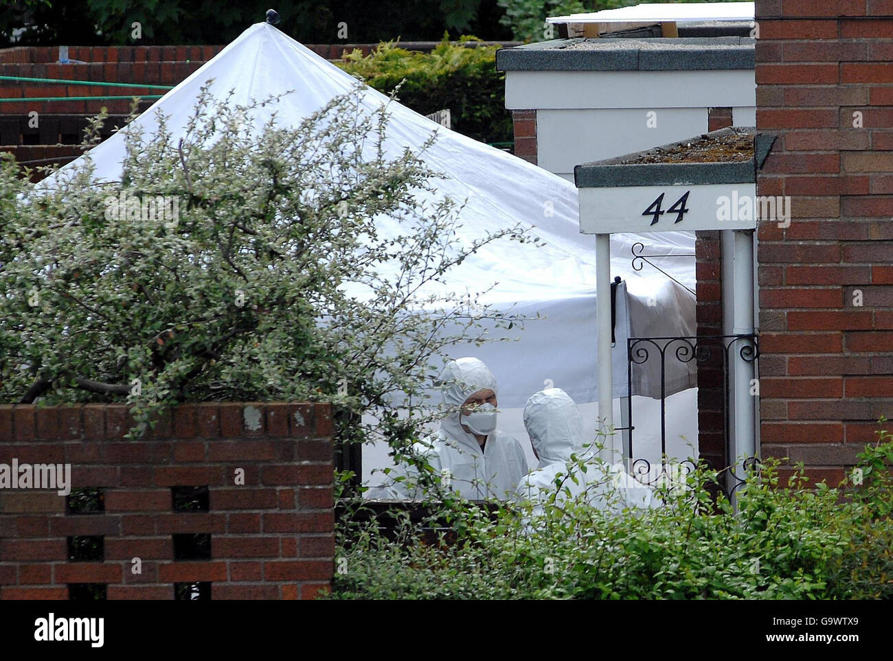 Forensic officers search the scene of yesterday's shootings at New Park Road, in the Castlefields area in Shrewsbury. Stock Photo