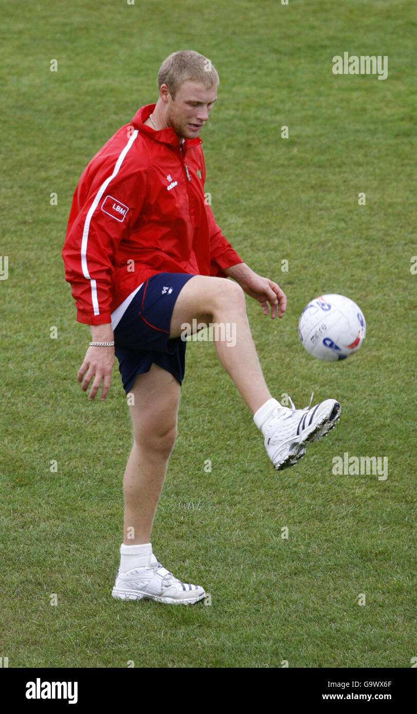 England and Lancashire cricketer Andrew Flintoff kicking a football on ...