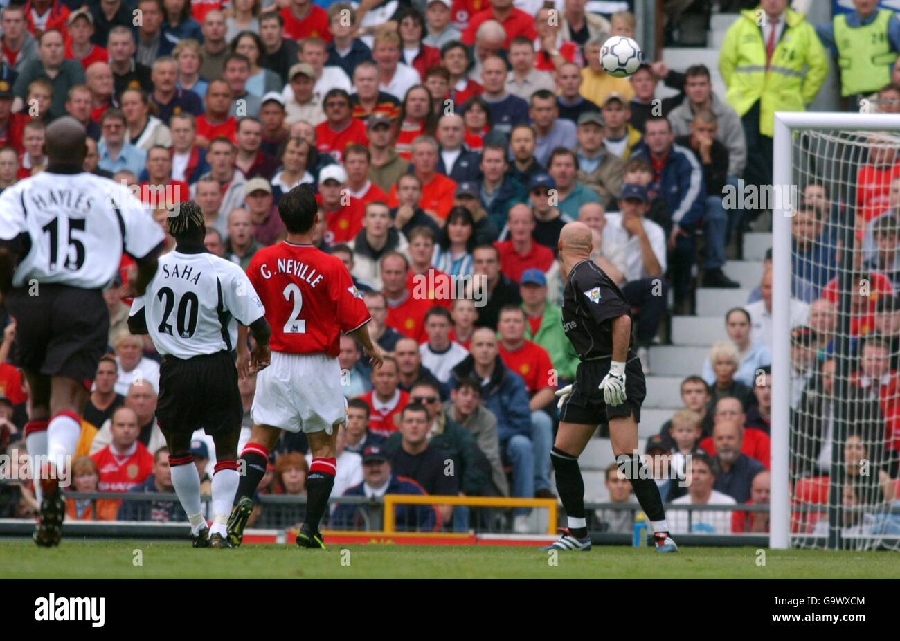 Fulham S Louis Saha Chips Fabien Barthez In The Manchester United Goal To Score The Opening Goal Of The Game Stock Photo Alamy