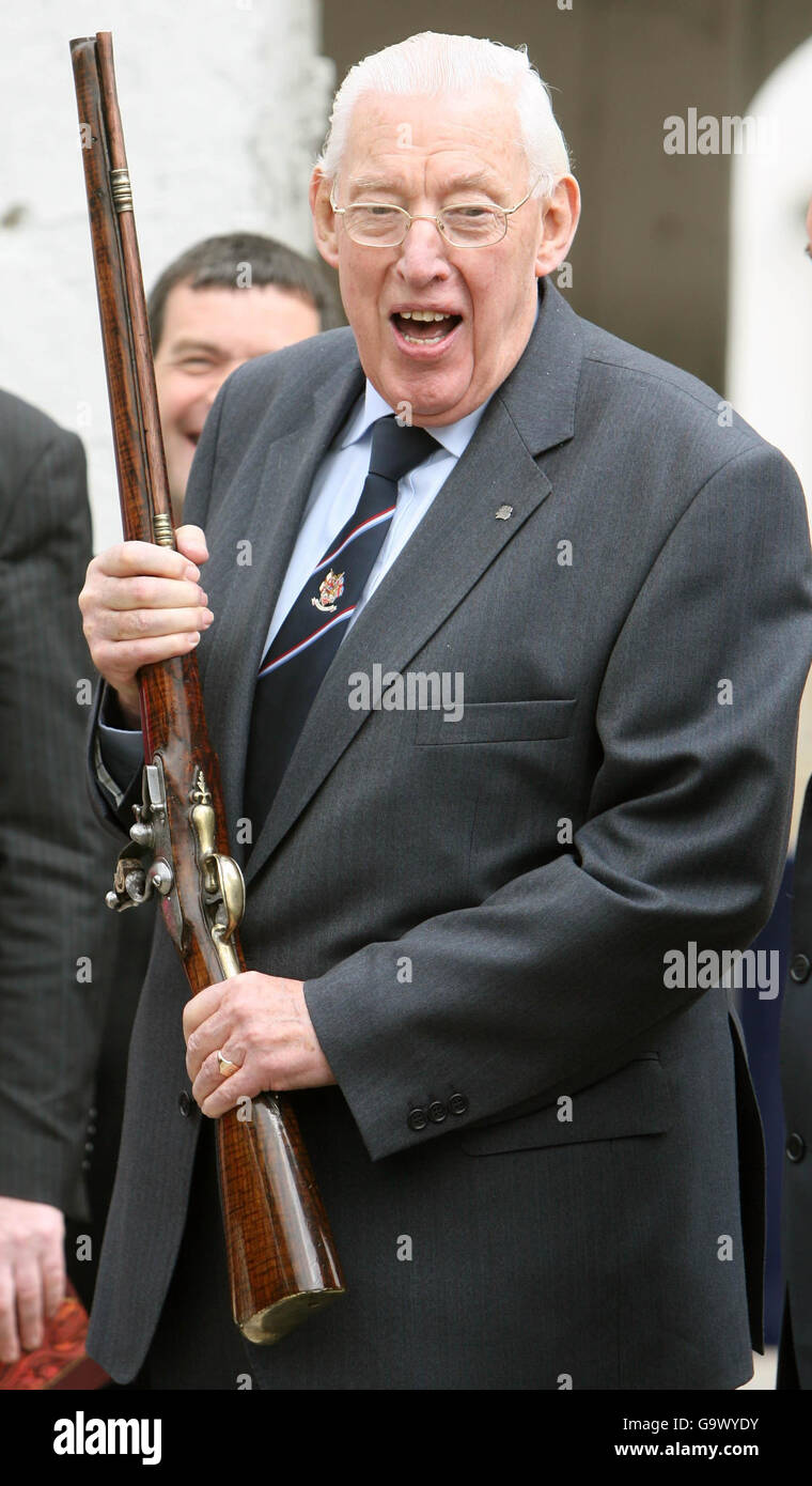 Northern Irelands First Minister Ian Paisley holds a three hundred year old musket during his visit to the historic Battle of the Boyne site in Co Meath. Mr Paisley was also joined by Taoiseach Bertie Ahern (unseen). Stock Photo