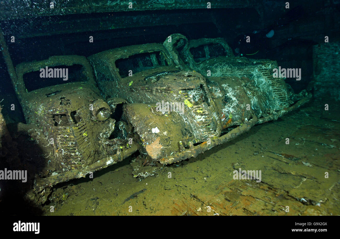 old FIAT cars, wreck of italian freighter Umbria, sunk 1941, Wingate Reef, Port Sudan, Sudan, Africa / Port Sudan Stock Photo