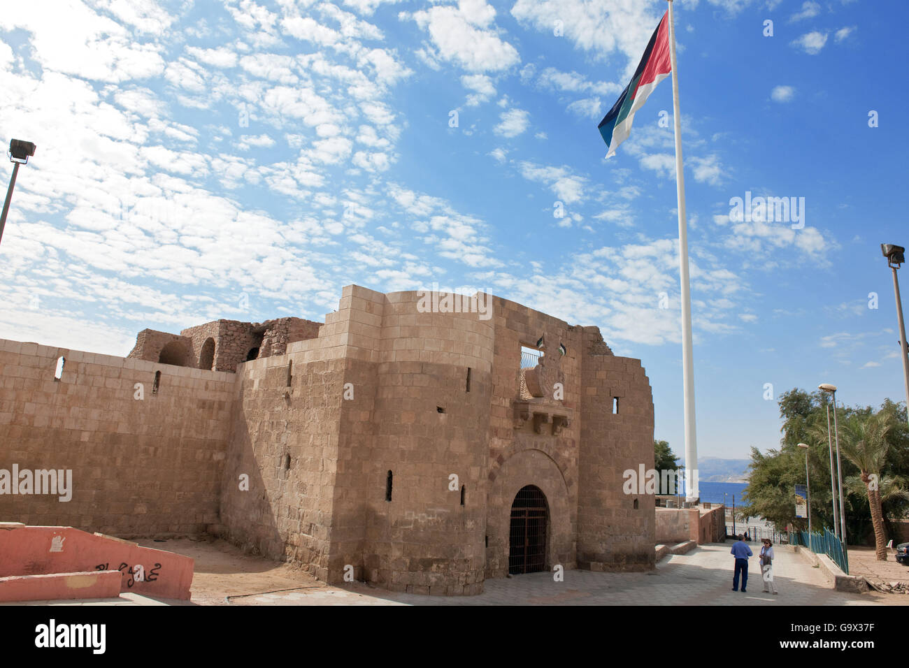 Aqaba Castle, Mamluk Castle, Aqaba Fort, Flagpole, Flag of Jordan / Akaba Stock Photo